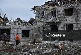 Aftermath of a Russian missile and drone attack in the town of ...